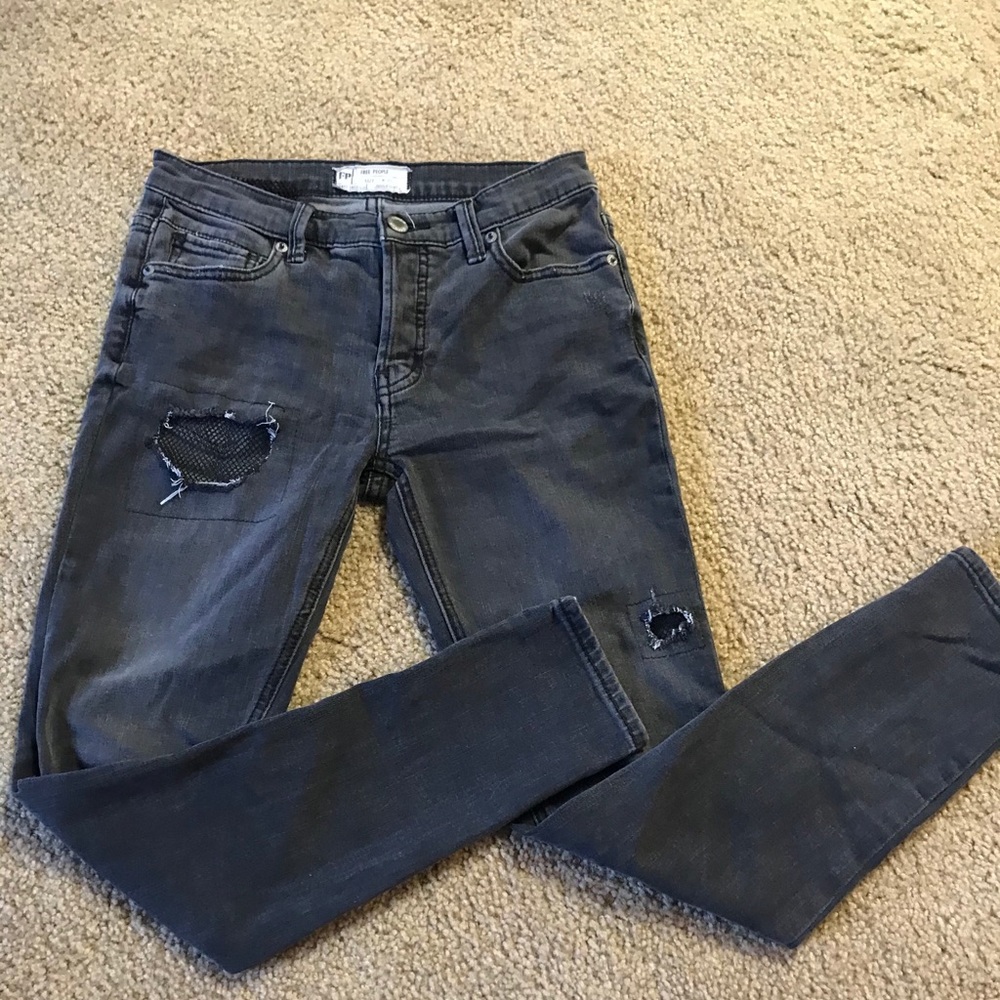 Black distressed mesh skinny jeans